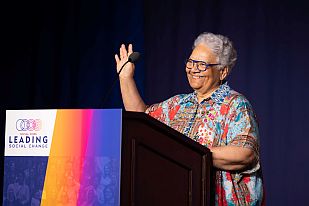 NASW President Yvonne Chase addresses conference attendees